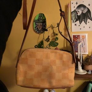 Small orange checkered purse with a long strap 🧡